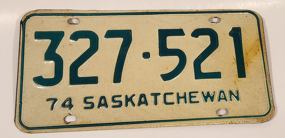 Vintage 1974 Saskatchewan Green Lettering White Vehicle License
