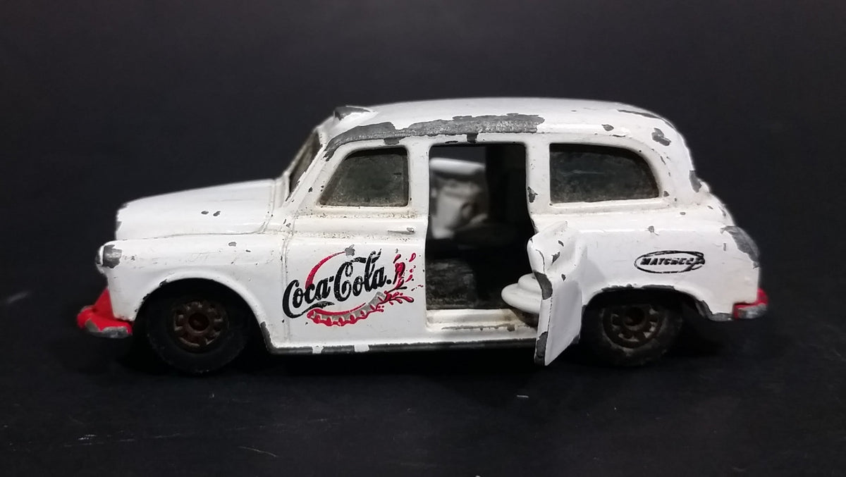1985-1986 Matchbox Mattel Coca-Cola Coke Taxi FX4R with Suicide