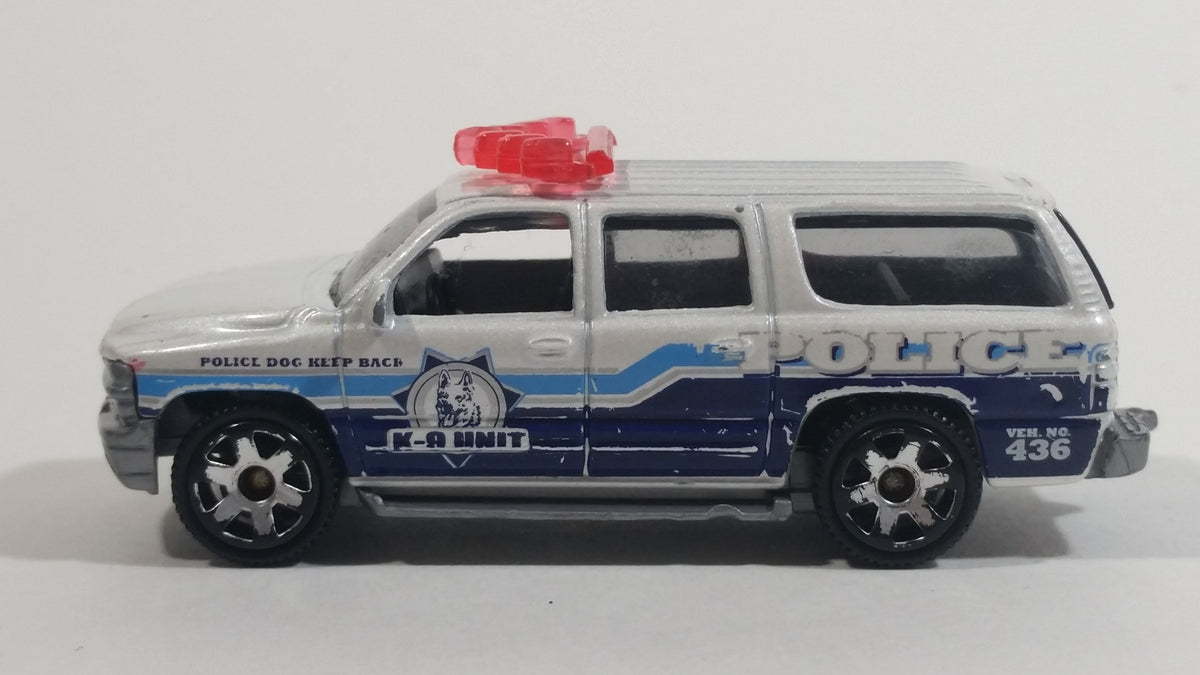 2012 Matchbox 2000 Chevrolet Suburban Police Dog K-9 Unit Pearl