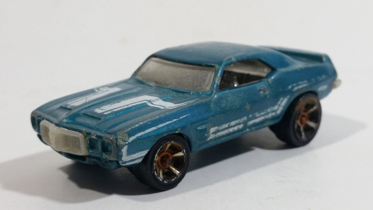Hot Wheels #69 Pontiac Firebird T/A 1969 - Série Muscle Mania 2010, échelle 1:64