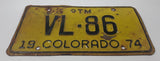 1974 Colorado Black Letters on Yellow GTM Gross Ton Mile Truck Metal Vehicle License Plate Tag VL 86