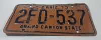 1973 Arizona Grand Canyon State C-2 Black Letters On Orange Metal Vehicle License Plate Tag 2FD 537