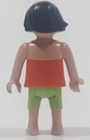 Geobra Playmobil Small Black Haired Girl Child Green Shorts Orange Blouse Tank Top 2 1/8" Tall Toy Figure
