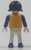 1995 Geobra Playmobil Small Black Haired Girl Child White Pants Blue Sweater with Yellow Red White Stripes 1/8" Tall Toy Figure