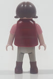 1992 Geobra Playmobil Small Brunette Girl Child Grey Pants Pink and Black Shirt with Magenta Vest 2 1/8" Tall Toy Figure