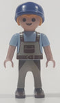 1995 Geobra Playmobil Small Blonde Boy Child Brown and Grey Overalls Light Blue Shirt Blue Hat 2 1/8" Tall Toy Figure