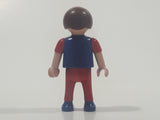 1995 Geobra Playmobil Small Brunette Boy Child Red Pants Dark Blue and Red Sleeved 54 Action Sports Shirt 2 1/8" Tall Toy Figure
