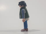 1994 Geobra Playmobil Black Hair Blue Pants White Blue and Grey Plaid Shirt with Olive Green Vest 2 3/4" Tall Toy Figure