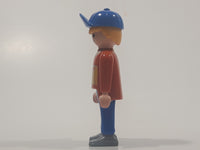 1992 Geobra Playmobil Blonde Hair Blue Pants Orange and Yellow Jacket with Blue Baseball Cap 2 3/4" Tall Toy Figure