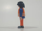 1990 Geobra Playmobil Black Hair Bright Orange Pants Blue Shirt Orange Vest 2 3/4" Tall Toy Figure
