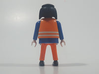 1990 Geobra Playmobil Black Hair Bright Orange Pants Blue Shirt Orange Vest 2 3/4" Tall Toy Figure