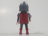 1993 Geobra Playmobil Grey Hair Armor Red Top Silver Helmet Medieval Soldier 2 3/4" Tall Toy Figure with Flag Accessory
