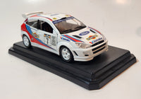 Burago 1999 Ford Focus Rally Martini White 1/24 Scale Die Cast Toy Car Vehicle on Stand