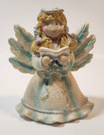 Angel Holding Song Book 4 3/4" Tall Resin Figurine