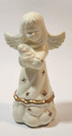 Angel Holding A New Born Baby 5" Tall Ceramic Figurine