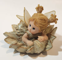 Angel Girl Child Lying on Flower 2 1/2" Tall Resin Figurine