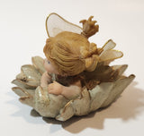 Angel Girl Child Lying on Flower 2 1/2" Tall Resin Figurine