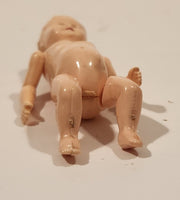 Vintage Reliable Products Baby Doll with Moving Limbs Toy Figure