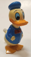 Tomy Walt Disney Productions Donald Duck Wobbling Shaking Wind Up Plastic Toy Figure