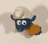 Vintage Peyo Bully Schleich Smurf With Biscuit Cookie 1 7/8" Tall PVC Toy Figure Made in West Germany