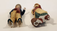 Man and Woman Christmas Carolling Porcelain Figure Christmas Tree Ornaments Set of 2