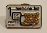 1883 to 1983 Medicine Hat 100th Anniversary Pioneer Days Gold Chuck Wagon Enamel Metal Lapel Pin