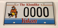 Yukon The Klondike Man Panning Gold Themed Metal Vehicle License Plate Tag 0000 Sample