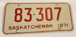 Vintage 1971 Saskatchewan Red Lettering White Vehicle License Plate Metal Tag 83 307