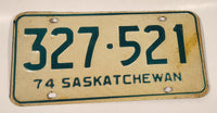 Vintage 1974 Saskatchewan Green Lettering White Vehicle License Plate Metal Tag 327 521