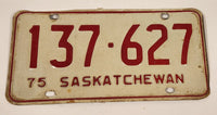 Vintage 1975 Saskatchewan Red Lettering White Vehicle License Plate Metal Tag 137 627