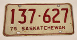 Vintage 1975 Saskatchewan Red Lettering White Vehicle License Plate Metal Tag 137 627