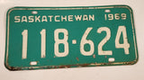 Vintage 1969 Saskatchewan White Lettering Green Vehicle License Plate Metal Tag 118 624