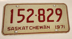 Vintage 1971 Saskatchewan Red Lettering White Vehicle License Plate Metal Tag 152 829