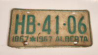 Vintage 1967 Alberta 1867-1967 Centennial Green Letters White Vehicle License Plate Tag HB 41 06