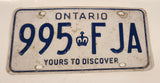 1986 to 1994 Ontario Yours To Discover White with Blue Letters Vehicle License Plate 995 FJA