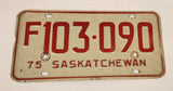 Vintage 1975 Saskatchewan Farm Vehicle Red Lettering White Vehicle License Plate Metal Tag 103 090