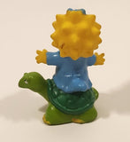 1990 TCFFC 139 The Simpsons Maggie Simpson on Turtle 2 3/4" Tall Rubber Toy Figure