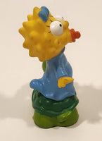 1990 TCFFC 139 The Simpsons Maggie Simpson on Turtle 2 3/4" Tall Rubber Toy Figure