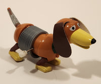 Disney Pixar Toy Story Poof Slinky Weiner Dog 4 3/4" Long Wind Up Toy Figure