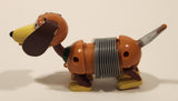 Disney Pixar Toy Story Poof Slinky Weiner Dog 4 3/4" Long Wind Up Toy Figure