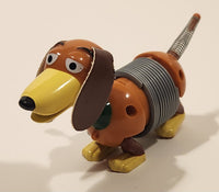 Disney Pixar Toy Story Poof Slinky Weiner Dog 4 3/4" Long Wind Up Toy Figure