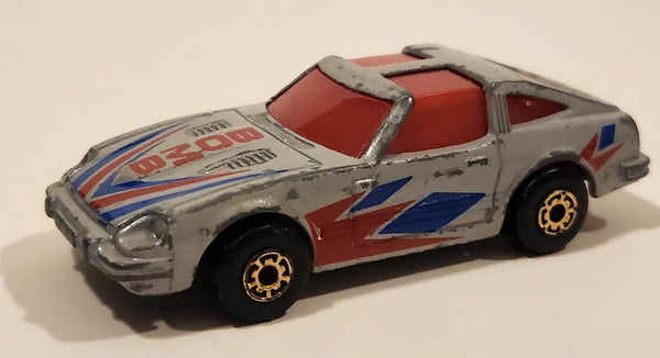 Vintage 1983 Matchbox Mega Blasters Cap Cars Datsun 280Z Bomb Silver Grey Die Cast Toy Car Vehicle