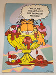 1978 Carlton United Features Syndicate Garfield Chocolate-- It's Not Just For Breakfast Anymore. Jim Davis 7 1/4" x 10 1/2" Over Sized Greeting Card