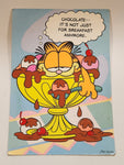 1978 Carlton United Features Syndicate Garfield Chocolate-- It's Not Just For Breakfast Anymore. Jim Davis 7 1/4" x 10 1/2" Over Sized Greeting Card