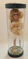 Girl Holding Butterfly in Green Grass Flower Meadow 10" Tall Porcelain Doll In Plastic Tube Display Case