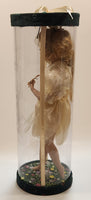 Girl Holding Butterfly in Green Grass Flower Meadow 10" Tall Porcelain Doll In Plastic Tube Display Case