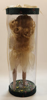Girl Holding Butterfly in Green Grass Flower Meadow 10" Tall Porcelain Doll In Plastic Tube Display Case