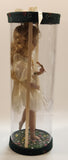 Girl Holding Butterfly in Green Grass Flower Meadow 10" Tall Porcelain Doll In Plastic Tube Display Case