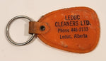 Vintage Leduc Cleaners Ltd. Leduc Alberta "Where Service Dwells and Cleaning Excels" Orange Plastic Fob Keychain Ring