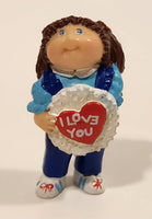 Vintage 1984 OAA Cabbage Patch Kids Girl Holding I Love You Heart Shaped Valentine 2 3/8" PVC Toy Figure